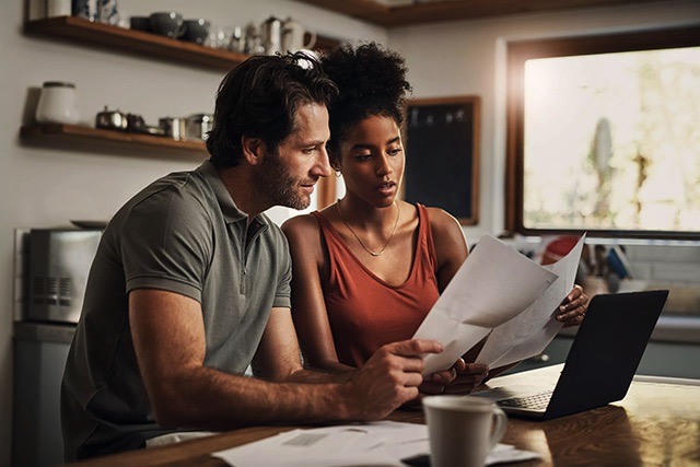 A couple reviewing vinyl flooring options