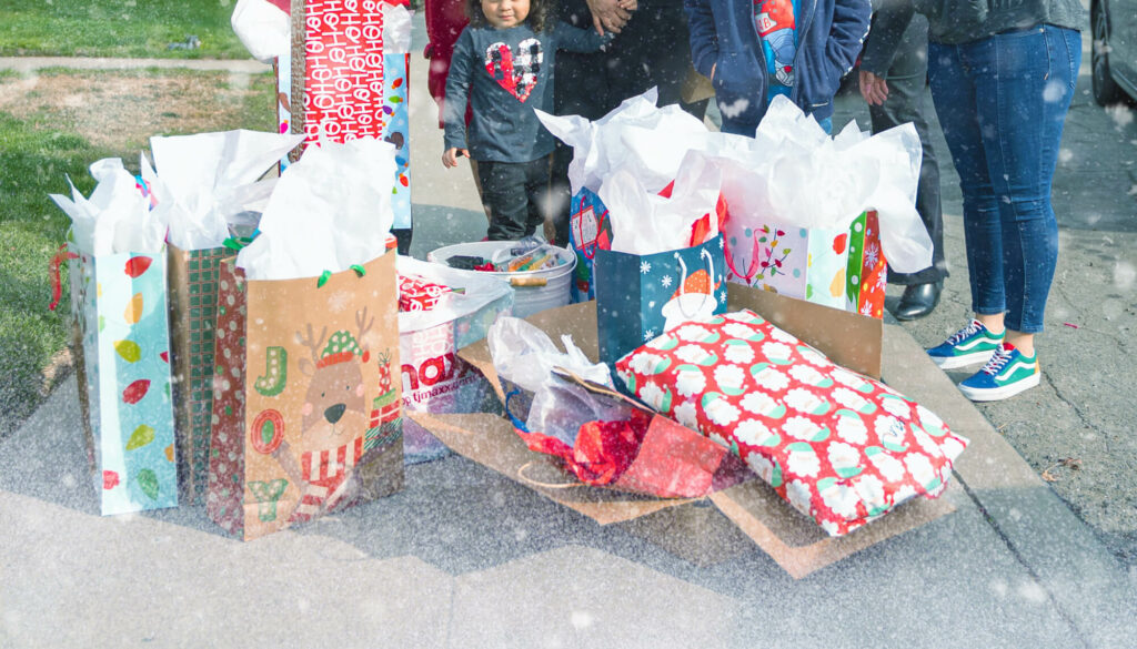 Gifts being presented to a family