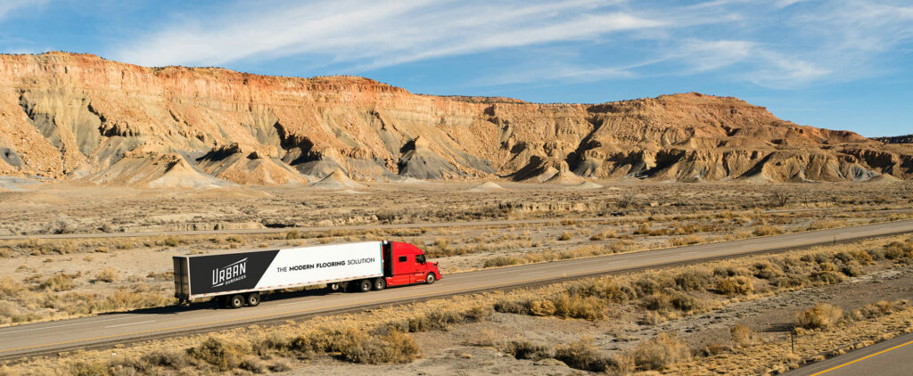 Urban Surfaces truck on the road with flooring materials