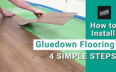 Person installing gluedown vinyl flooring to demonstrate how to install gluedown flooring in 4 simple steps.