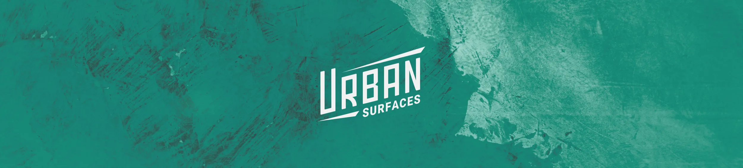 Urban Surfaces logo on a textured green banner